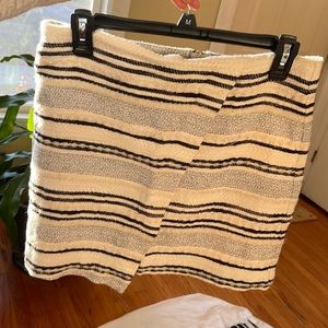 H&M skirt. Wool-like material. Stripes but with a slight A-line.